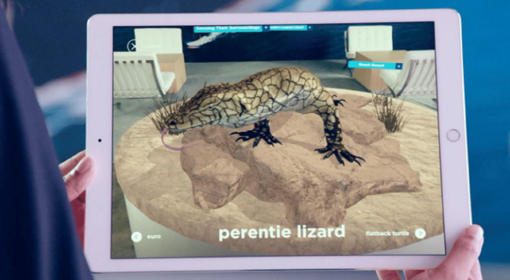 Photo of tablet showing lzard image from Chevron experience
